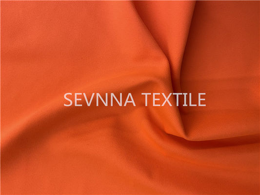 La protection UV a réutilisé l'orange coupée libre de bout droit de manière du Spandex 4 de tissu de vêtements de bain
