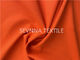 La protection UV a réutilisé l'orange coupée libre de bout droit de manière du Spandex 4 de tissu de vêtements de bain