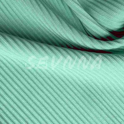 Le tissu spandex en polyester est le tissu idéal pour un style de vie actif et à la mode