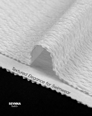 Tissu en double maille jacquard tricoté pour des produits textiles durables et polyvalents