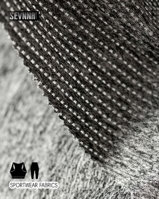 Tissu de leggings extensible et doux avec une grande élasticité et des propriétés de gestion de l'humidité, idéal pour les vêtements de sport et le quotidien