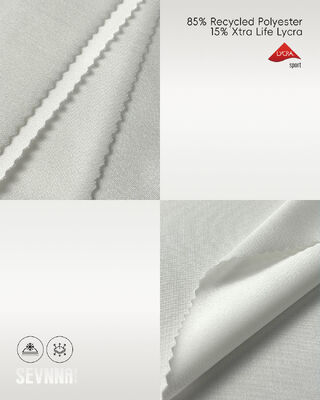 Tissu Lycra étiré avec 85% de polyester recyclé, protection contre les UV et absorption de l'humidité pour les vêtements d'activité et les maillots de bain