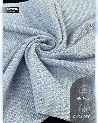 Tissu en polyester recyclé respectueux de l'environnement conçu pour répondre à la demande croissante de matières textiles durables et responsables